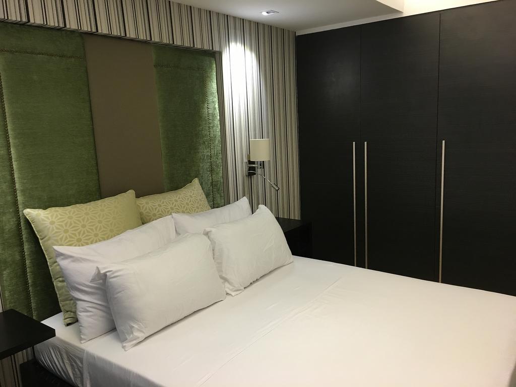 Shang Luxury Suites Mandaluyong Rum bild